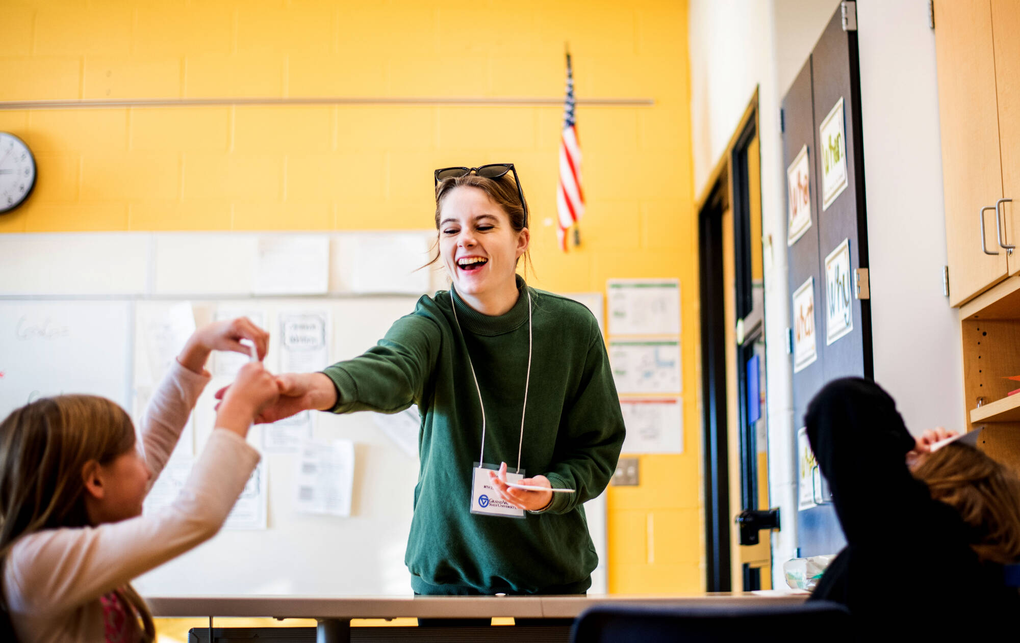Student teacher working with students